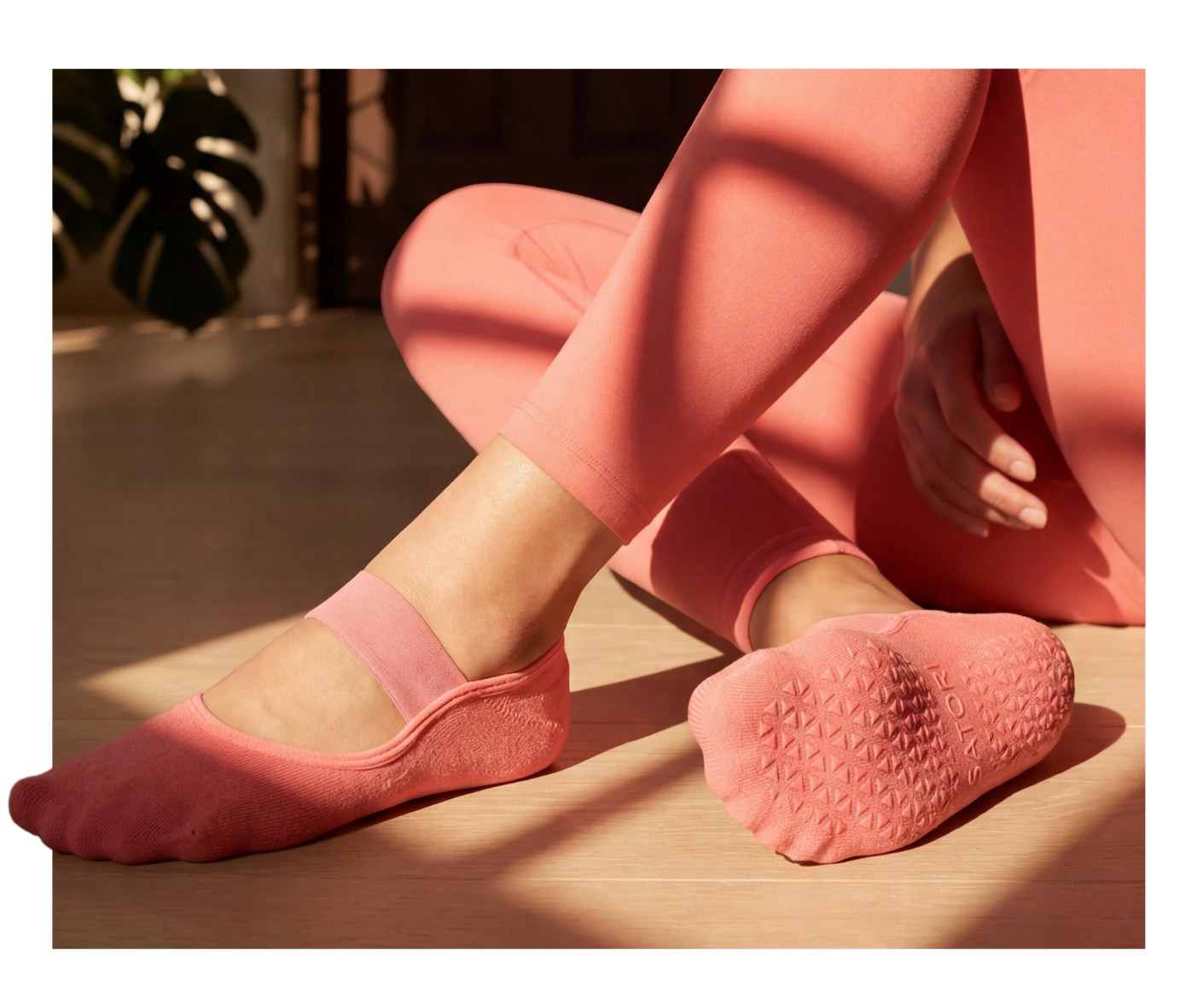 Black Satori ballet grip socks with single strap design, offering non-slip comfort and elegant support for Pilates and Barre.