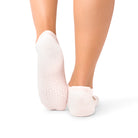 Aya Petaluxe  organic grip socks for Pilates and yoga on Dubai studio floor