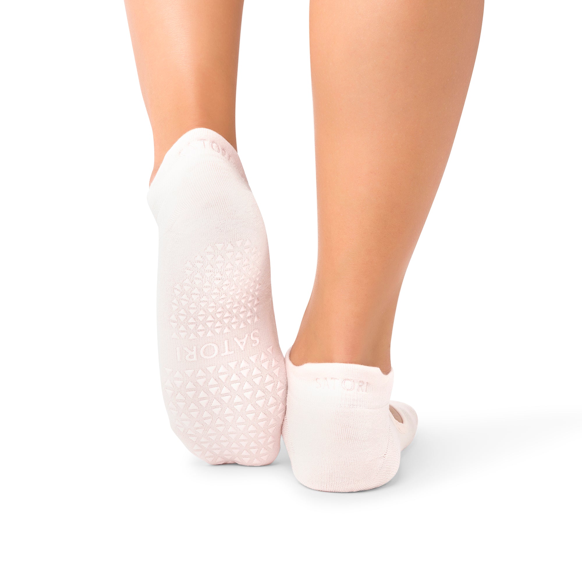 Aya Petaluxe  organic grip socks for Pilates and yoga on Dubai studio floor