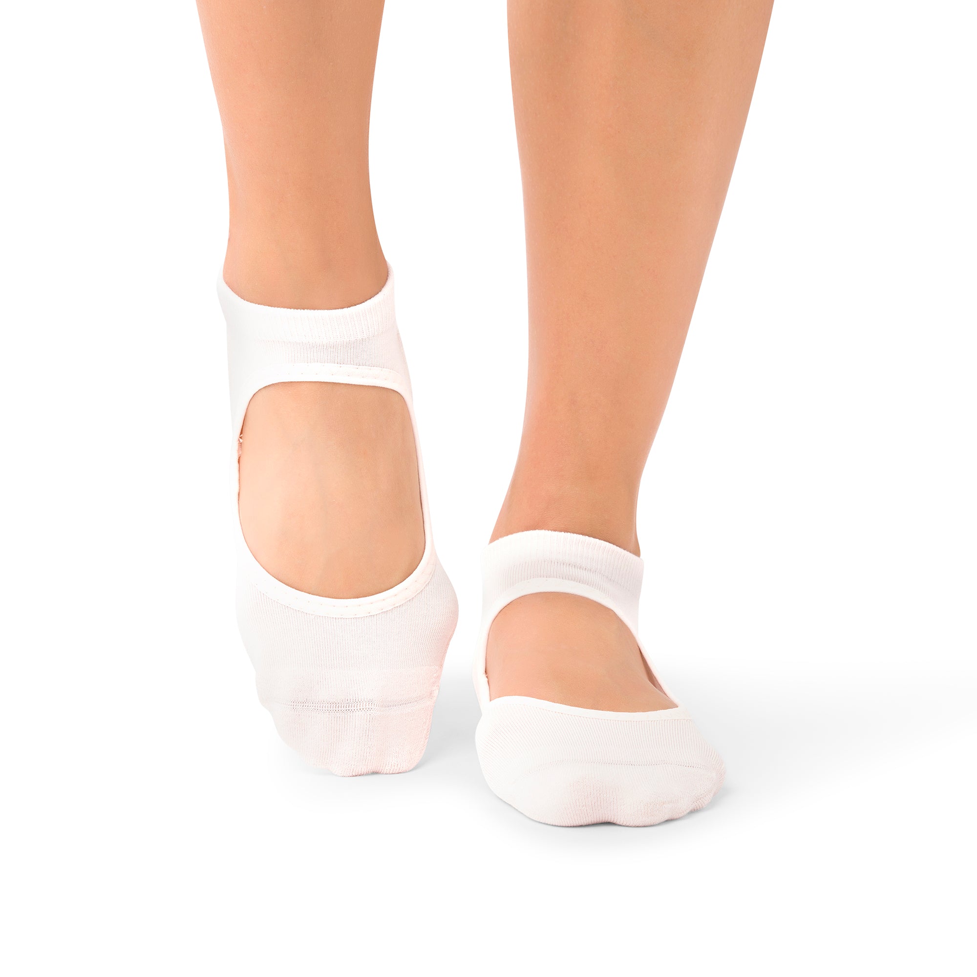 Middle Eastern woman wearing elegant Aya Petaluxe grip socks in yoga class