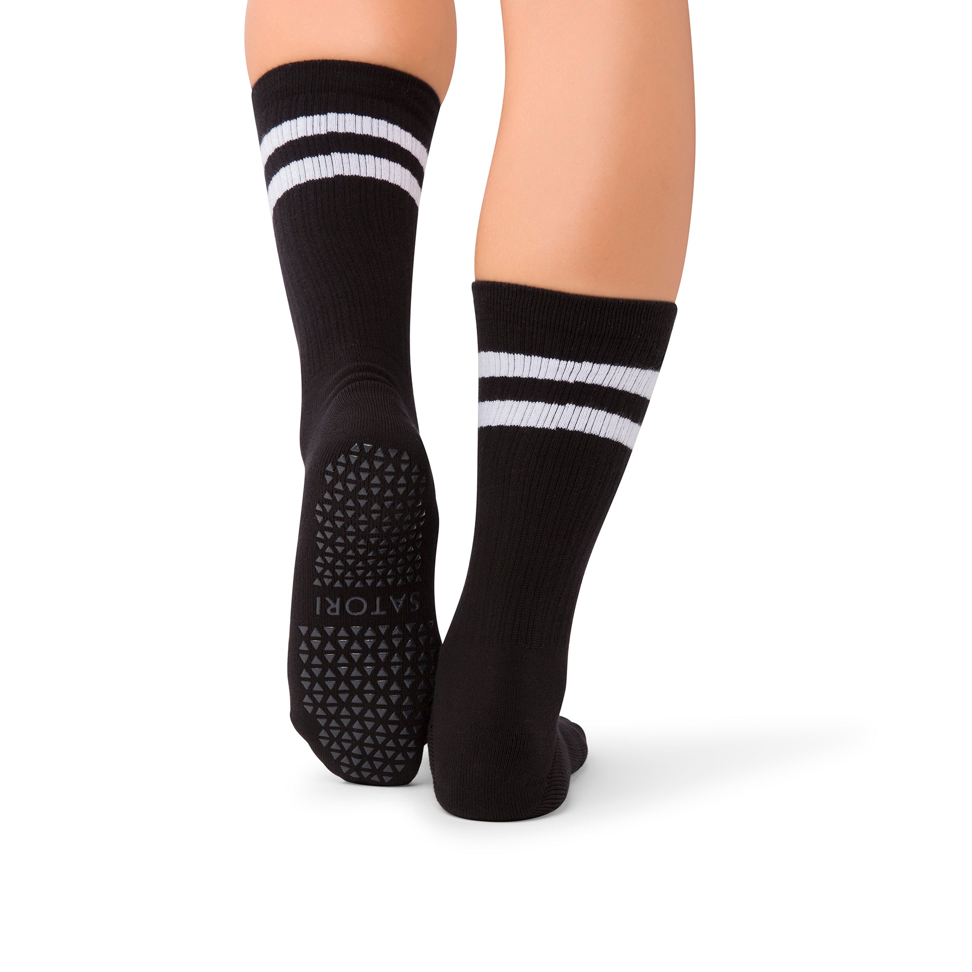 Mio Midnight crew grip socks worn in a Abu Dhabi yoga class