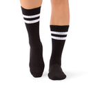 Mio Midnight crew grip socks worn in a Dubai yoga class