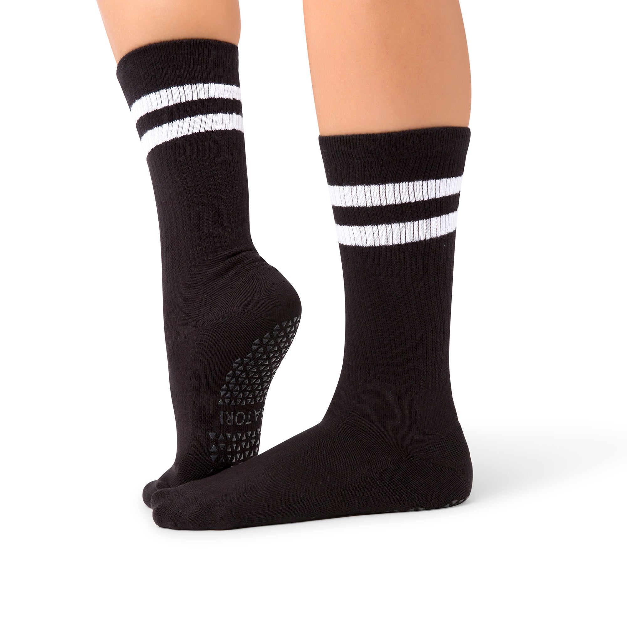 Mio Midnight crew grip socks worn in a GCC