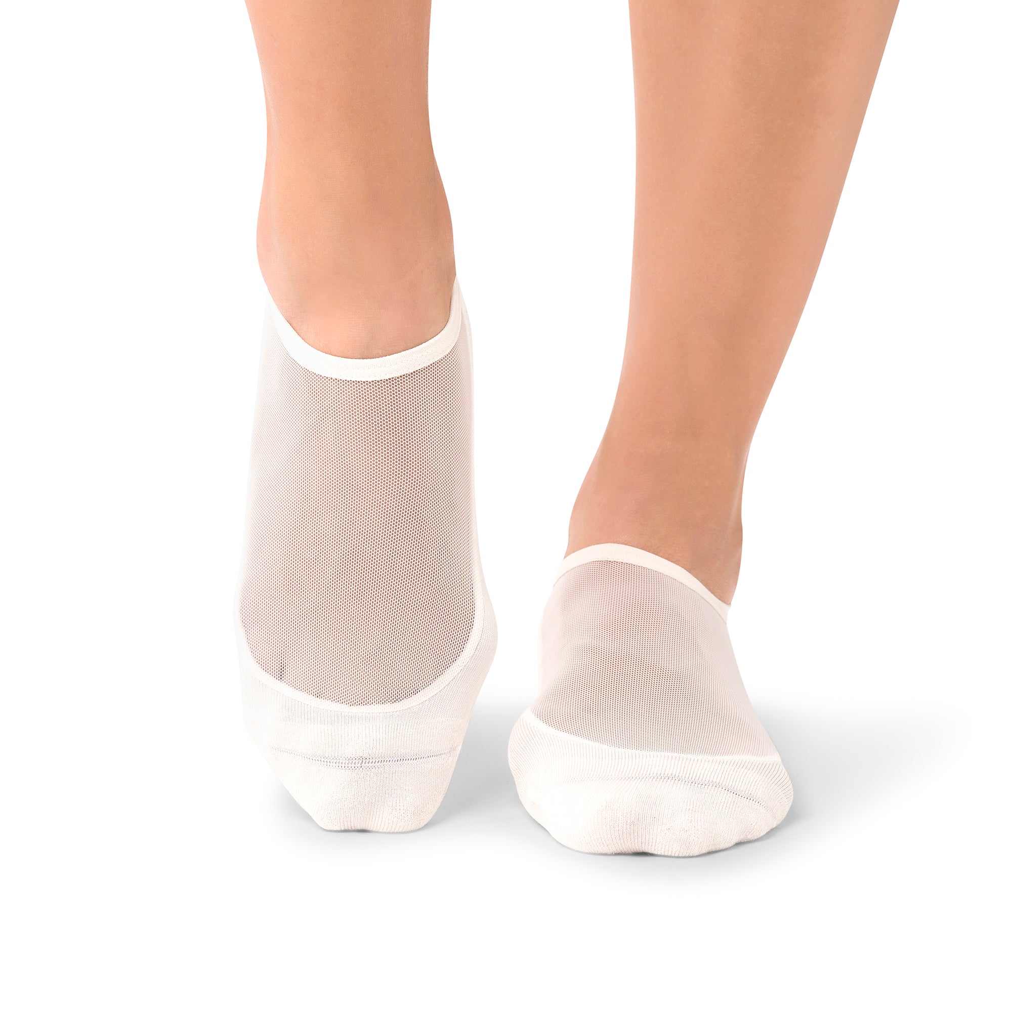 Sora Ivory Blush mesh grip socks in black worn during Pilates for non-slip stability and breathability